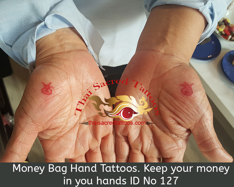 Money Bag Hand Thia Tattoos. Keep your money in you hands